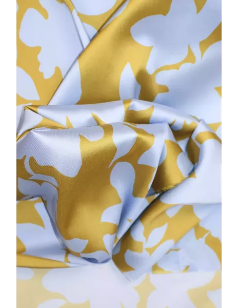Tissu Satin de polyester imprimé fleurs ocre chaud / bleu