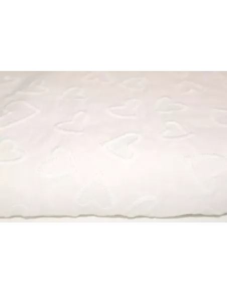 Tissu coton brodé de cœurs blancs